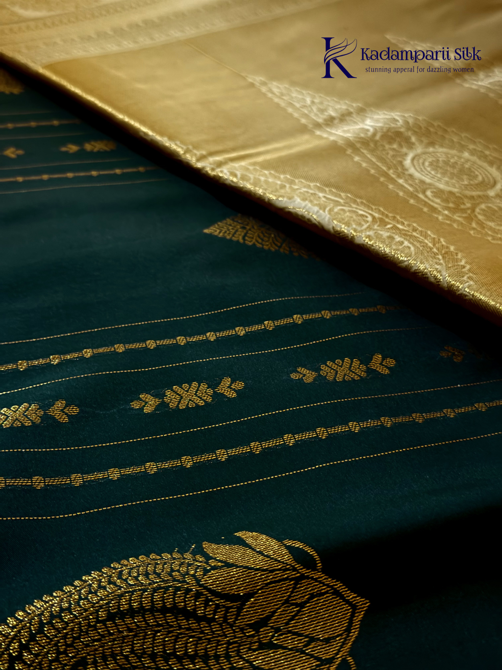Kadamparii Silk royal navy blue semi soft silk saree with gold zari motifs, paisley design, grand zari woven pallu, and tassel detailing.