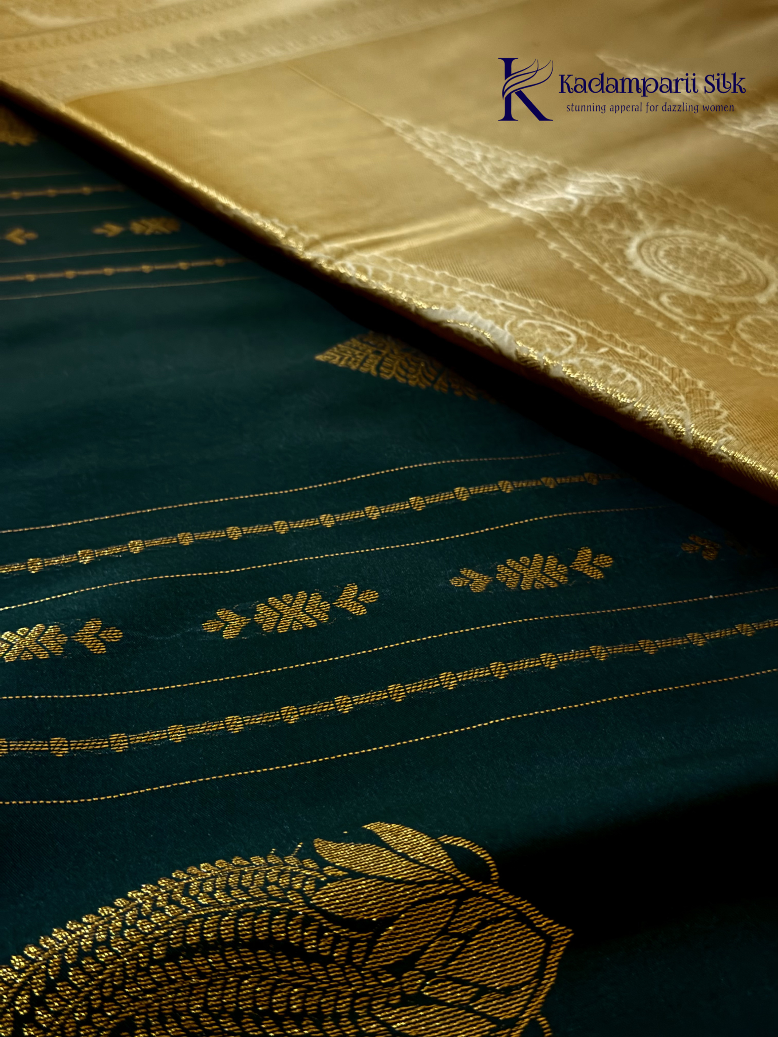Kadamparii Silk royal navy blue semi soft silk saree with gold zari motifs, paisley design, grand zari woven pallu, and tassel detailing.