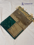 Kadamparii Silk teal green jute mixed semi soft silk saree with golden zari border, woven pallu, subtle motifs, and tassel detailing.