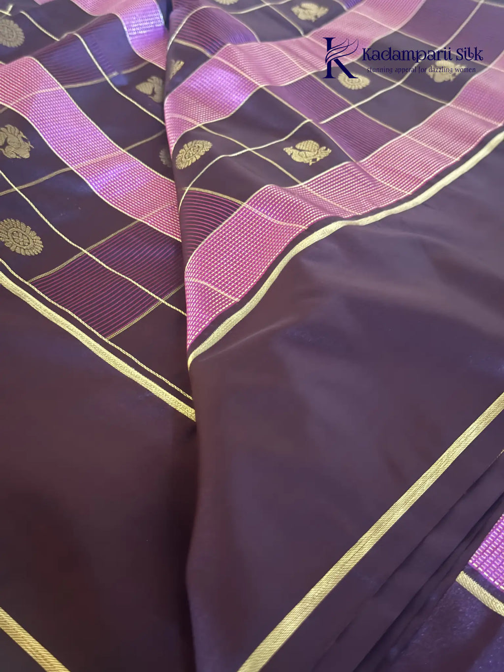 Kadamparii Silk royal wine semi soft silk checked saree with golden zari border, traditional woven pallu, and tassel detailing.