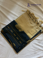 Kadamparii Silk royal navy blue semi soft silk saree with gold zari motifs, paisley design, grand zari woven pallu, and tassel detailing.
